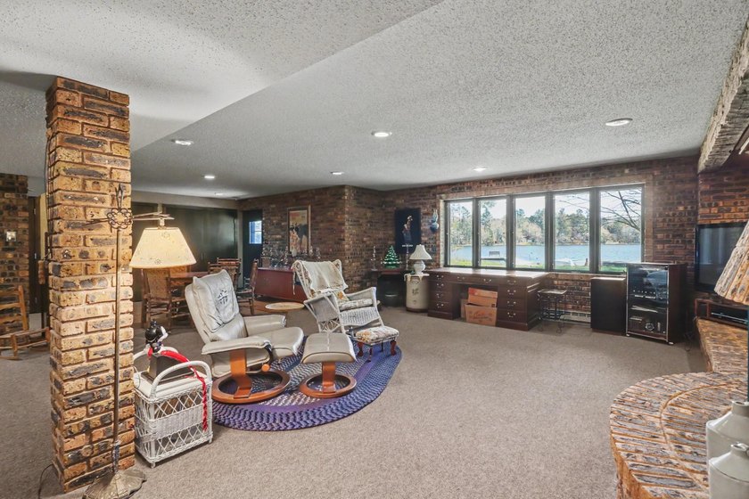 Nestled on nearly 4 private acres along the shores of 54 acre - photo 24
