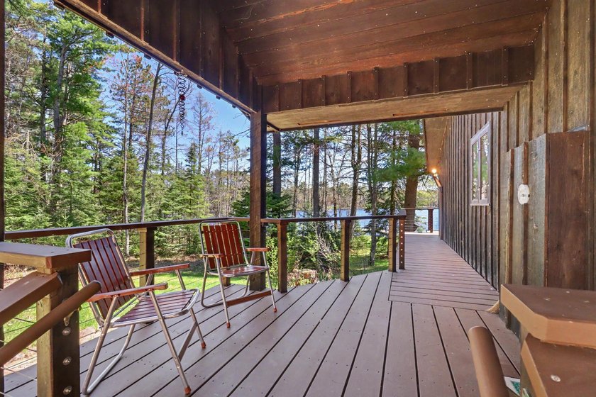Nestled on nearly 4 private acres along the shores of 54 acre - photo 34