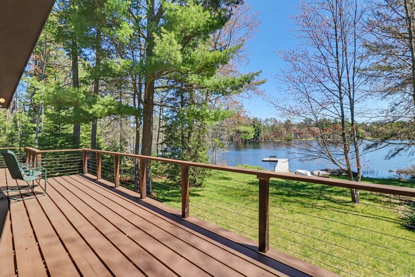 Nestled on nearly 4 private acres along the shores of 54 acre - photo 36