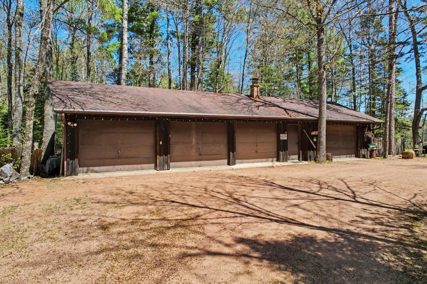 Nestled on nearly 4 private acres along the shores of 54 acre - photo 38