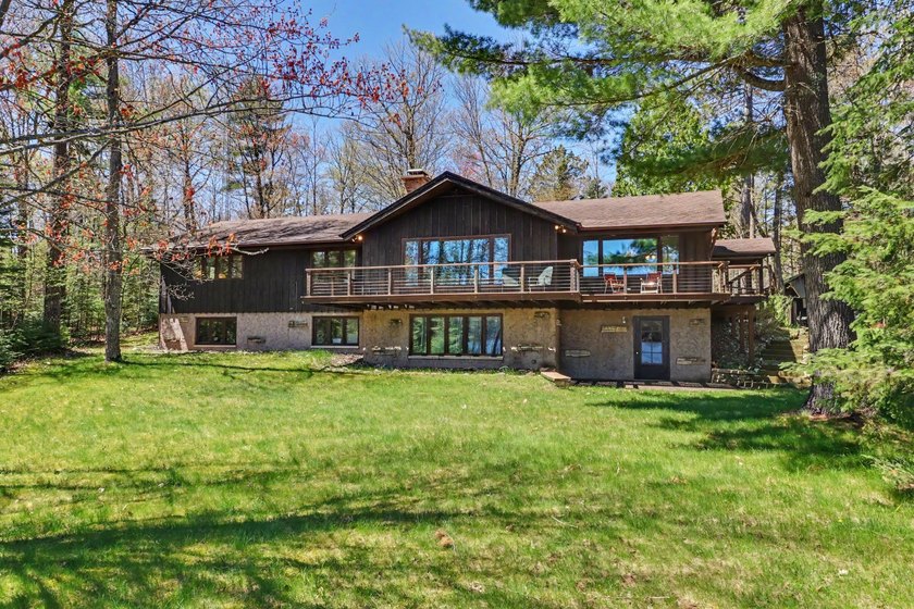 Nestled on nearly 4 private acres along the shores of 54 acre - photo 47