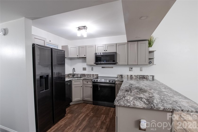 Renovated 2 bedroom, 2 bath townhome offering 1,200 square feet - photo 4