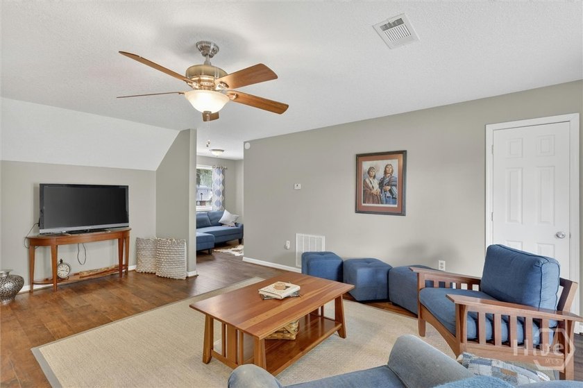 Nestled beneath 22 mature oak trees and surrounded by coastal - photo 25