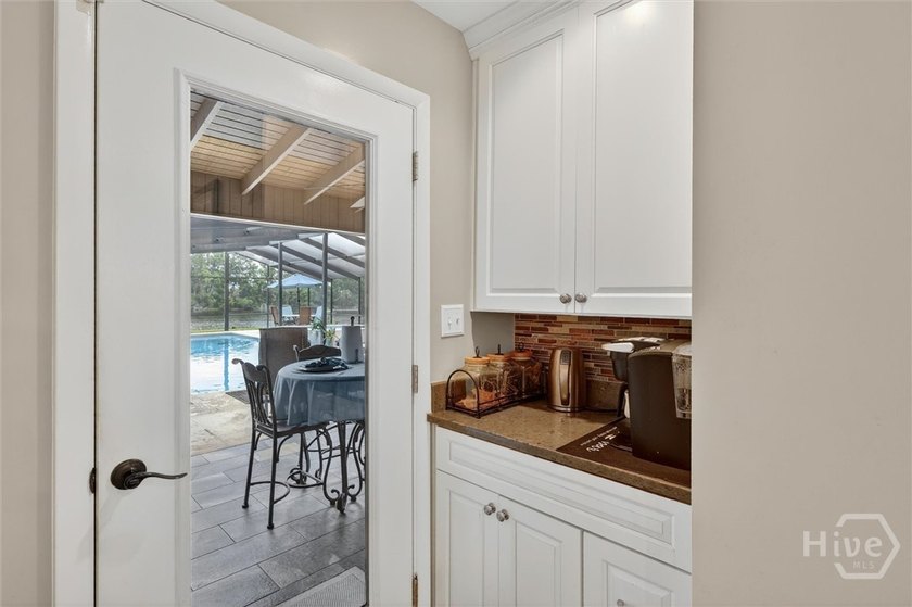 Nestled beneath 22 mature oak trees and surrounded by coastal - photo 31
