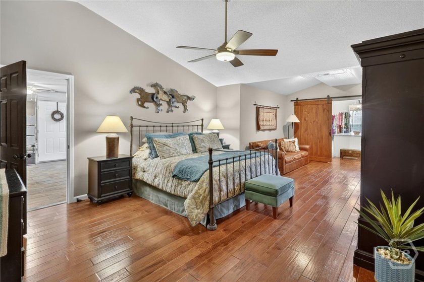 Nestled beneath 22 mature oak trees and surrounded by coastal - photo 35