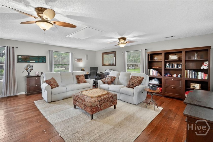 Nestled beneath 22 mature oak trees and surrounded by coastal - photo 42