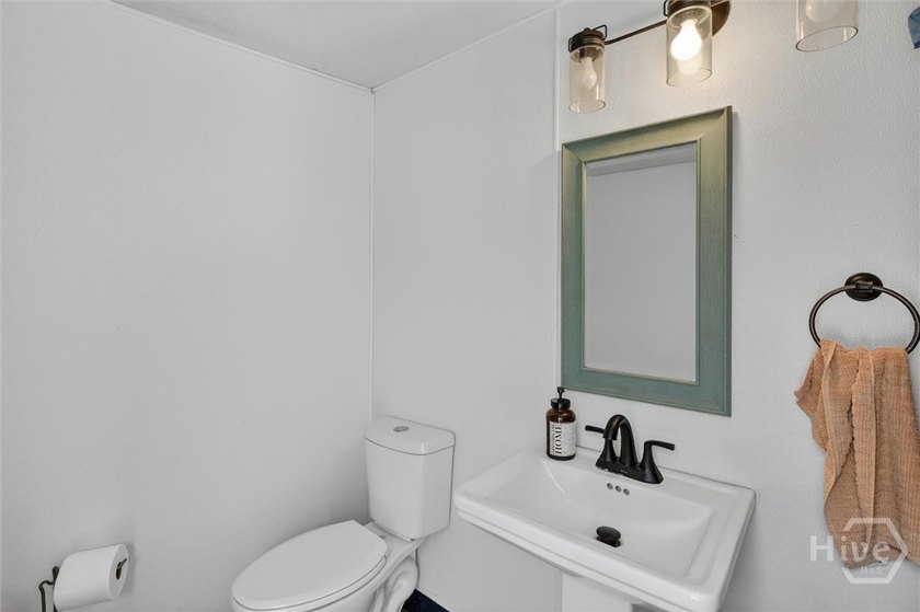 Nestled beneath 22 mature oak trees and surrounded by coastal - photo 43