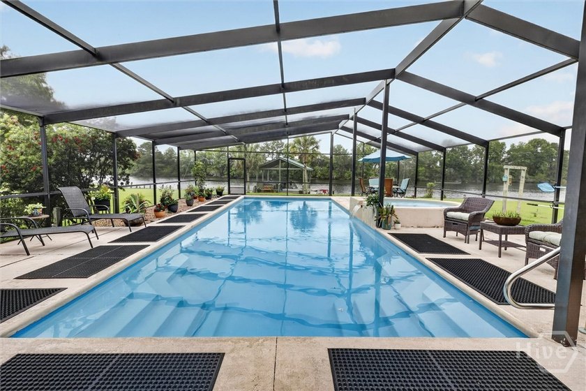 Nestled beneath 22 mature oak trees and surrounded by coastal - photo 46