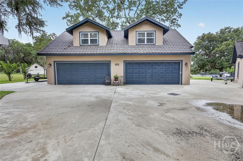 Nestled beneath 22 mature oak trees and surrounded by coastal - photo 49