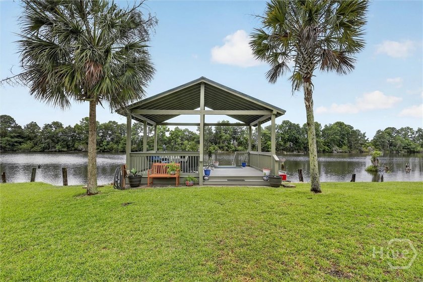 Nestled beneath 22 mature oak trees and surrounded by coastal - photo 50