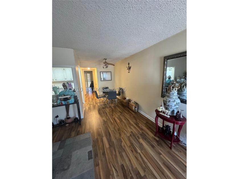 CHARMING 1/1- 2ND FLR UNIT- IN CV-24HR SECURITY GUARD GATED - photo 4
