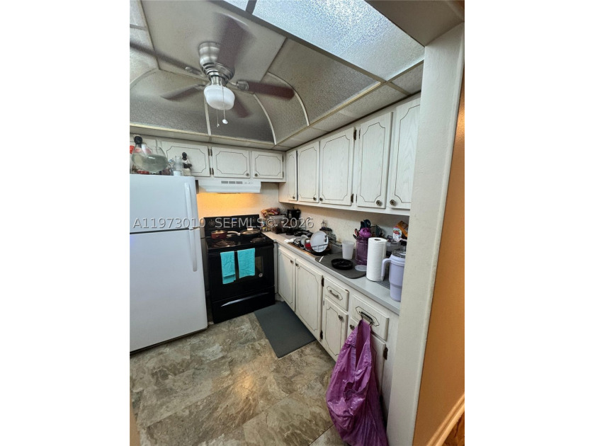 CHARMING 1/1- 2ND FLR UNIT- IN CV-24HR SECURITY GUARD GATED - photo 6