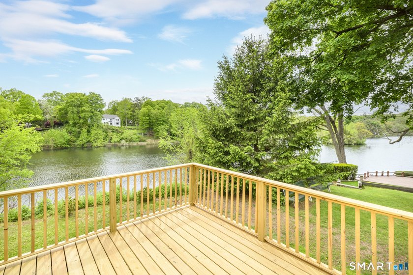Perched above the water with expansive, unobstructed lake views - photo 2