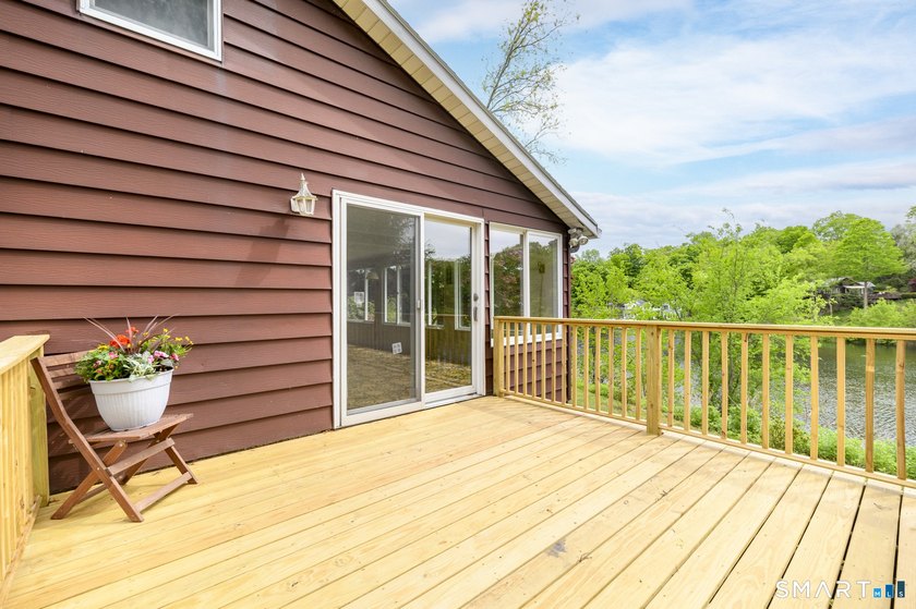 Perched above the water with expansive, unobstructed lake views - photo 3
