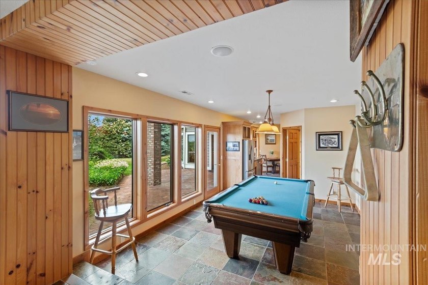 Nestled on a sprawling 4.5-acre estate, this breathtaking - photo 31