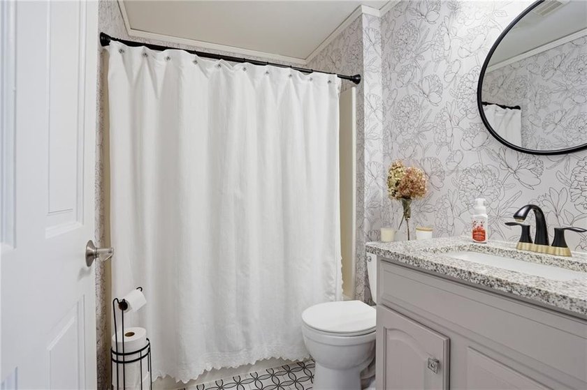Welcome home to this beautifully renovated ranch, perfectly - photo 28