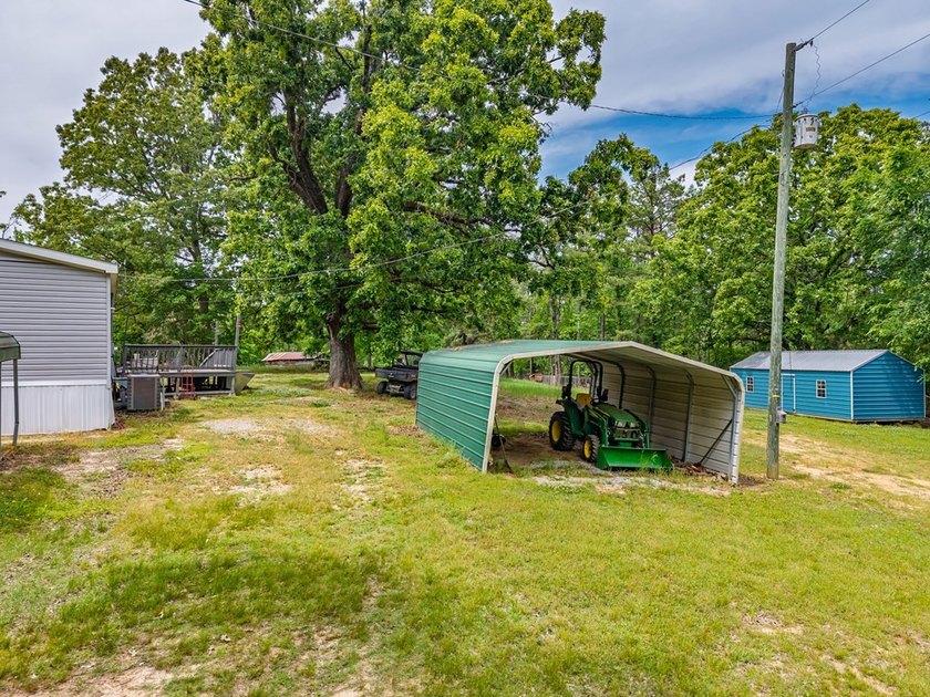 Well-maintained 3 bedroom, 2 bath mobile home on 74 acres. The - photo 33