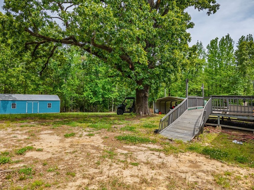 Well-maintained 3 bedroom, 2 bath mobile home on 74 acres. The - photo 40
