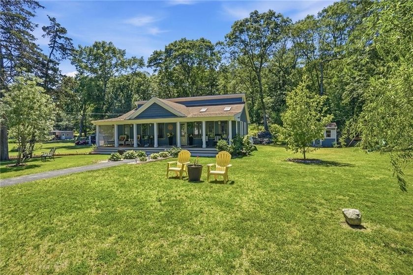 Welcome home to this beautifully renovated ranch, perfectly - photo 40