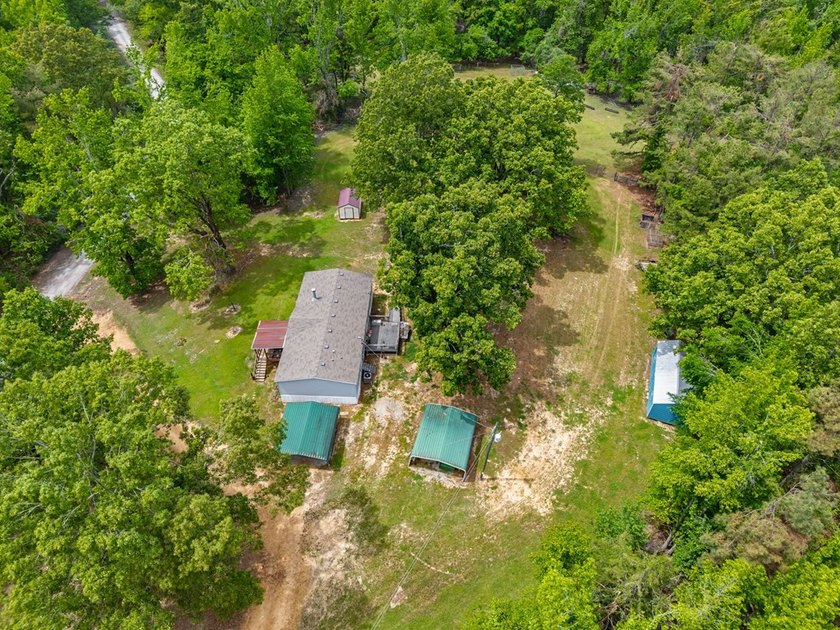 Well-maintained 3 bedroom, 2 bath mobile home on 74 acres. The - photo 43