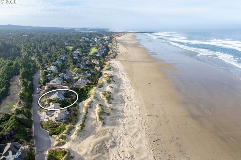 A truly unique opportunity in an upscale beachfront community of - photo 4