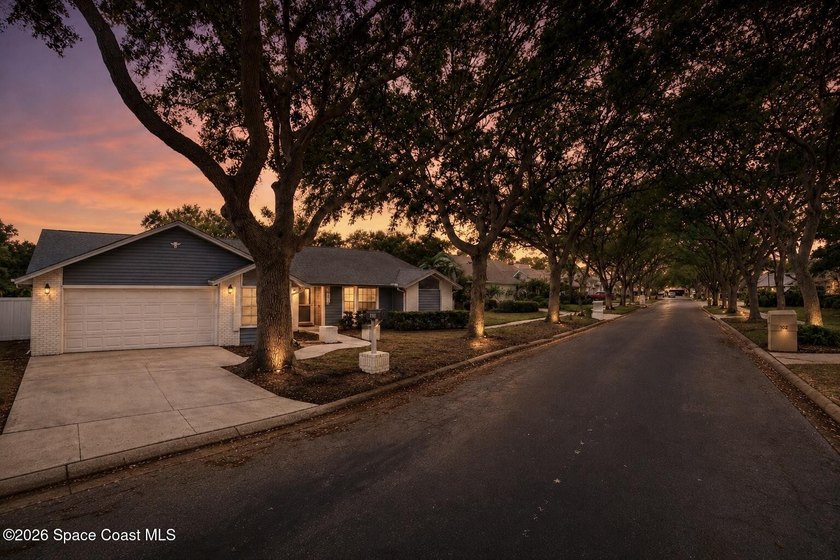 Tucked inside the highly sought-after neighborhood of Windward - photo 2