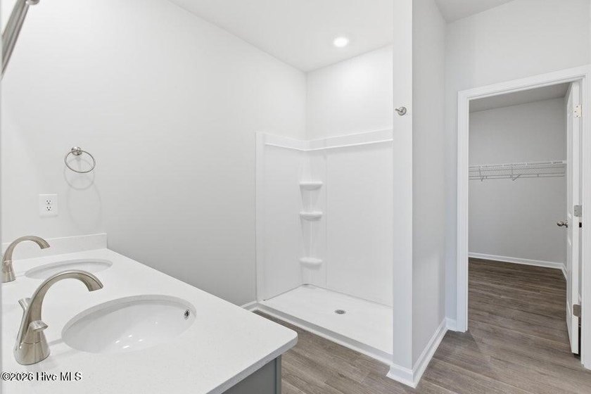The Retreat plan offers a well-designed single-story layout with - photo 7