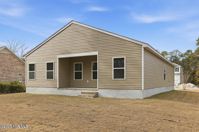The Retreat plan offers a well-designed single-story layout with - photo 9
