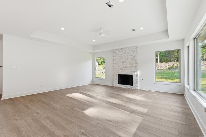 This 4 bed, 3.5 bath home sits on a flat 0.5 acre lot with 115' - photo 11