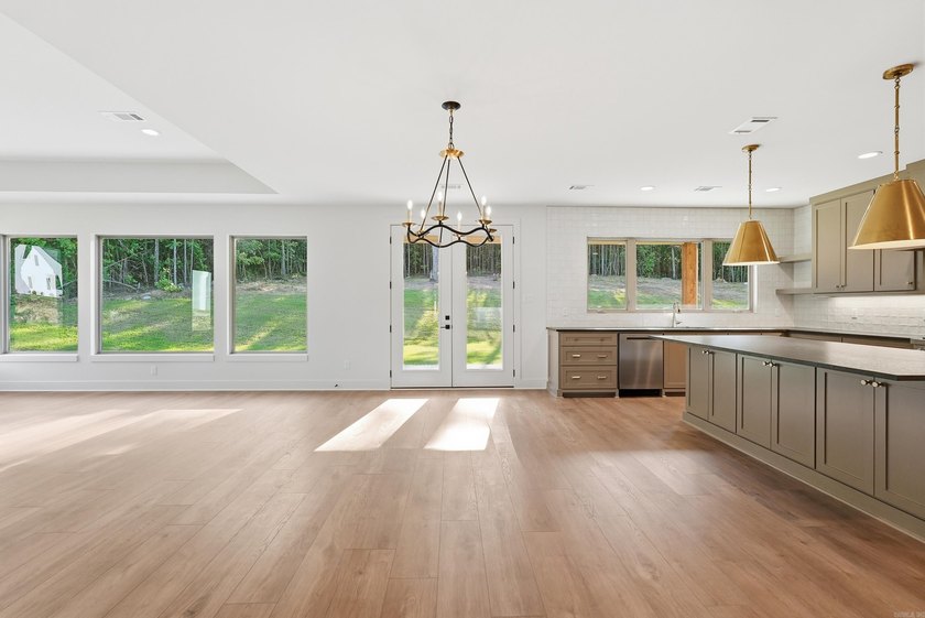 This 4 bed, 3.5 bath home sits on a flat 0.5 acre lot with 115' - photo 16