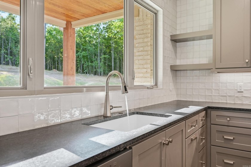 This 4 bed, 3.5 bath home sits on a flat 0.5 acre lot with 115' - photo 22