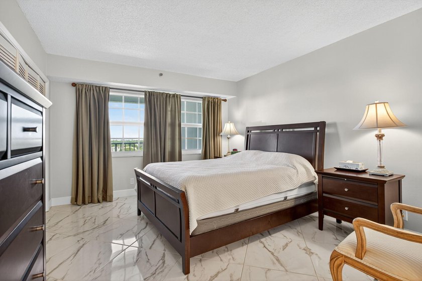 Stunning 2-bedroom, 2-bath ALL AGES condo on the 9th floor with - photo 25