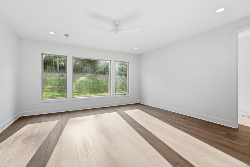 This 4 bed, 3.5 bath home sits on a flat 0.5 acre lot with 115' - photo 28