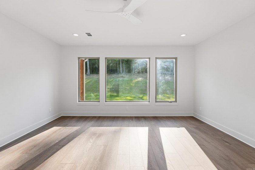 This 4 bed, 3.5 bath home sits on a flat 0.5 acre lot with 115' - photo 29