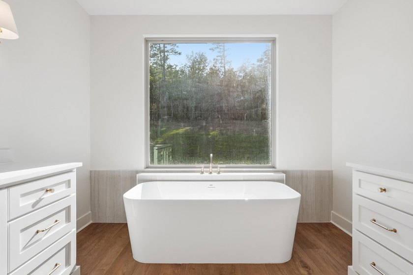 This 4 bed, 3.5 bath home sits on a flat 0.5 acre lot with 115' - photo 32