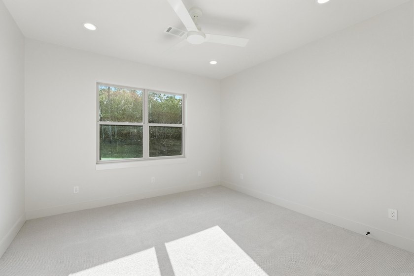 This 4 bed, 3.5 bath home sits on a flat 0.5 acre lot with 115' - photo 40