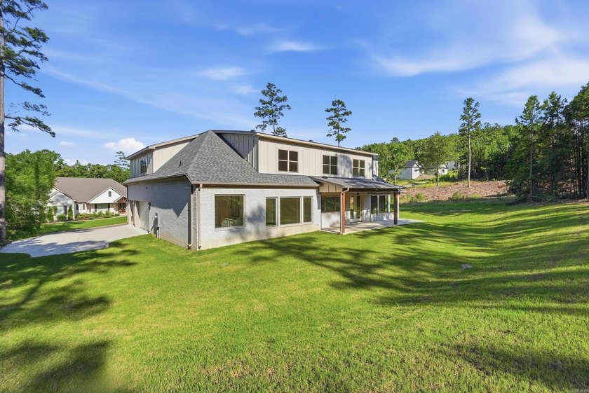 This 4 bed, 3.5 bath home sits on a flat 0.5 acre lot with 115' - photo 44