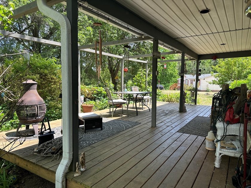 #73300-Welcome to Country Corner!! Set on 9.05 private acres in - photo 3