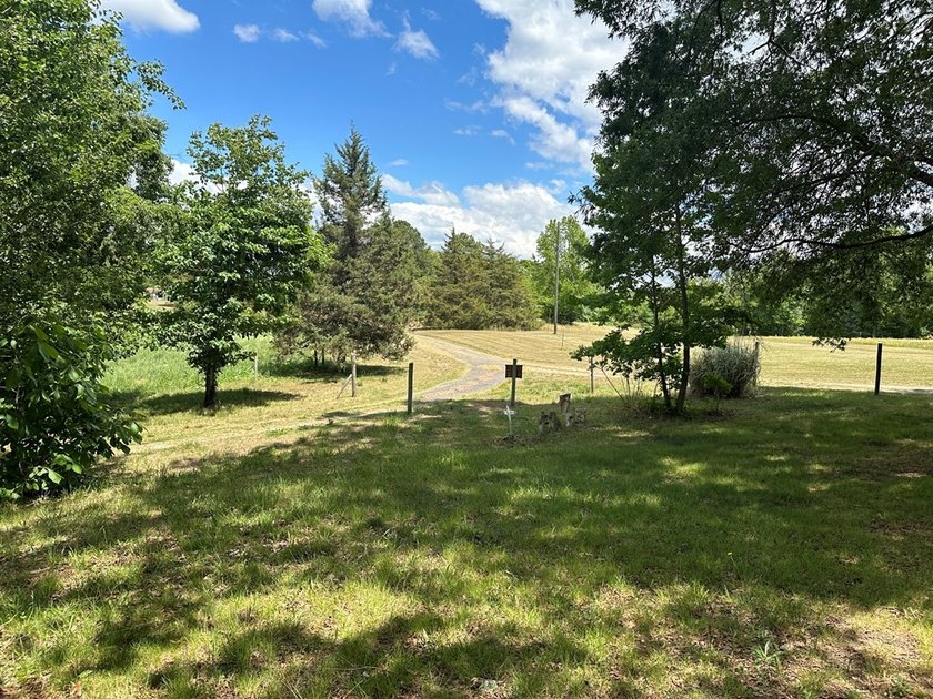 #73300-Welcome to Country Corner!! Set on 9.05 private acres in - photo 5