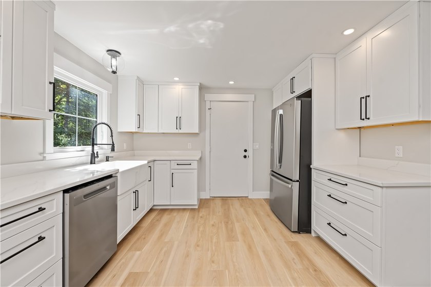 Beautifully updated 4-bedroom, 1.5-bath Colonial nestled on a - photo 11