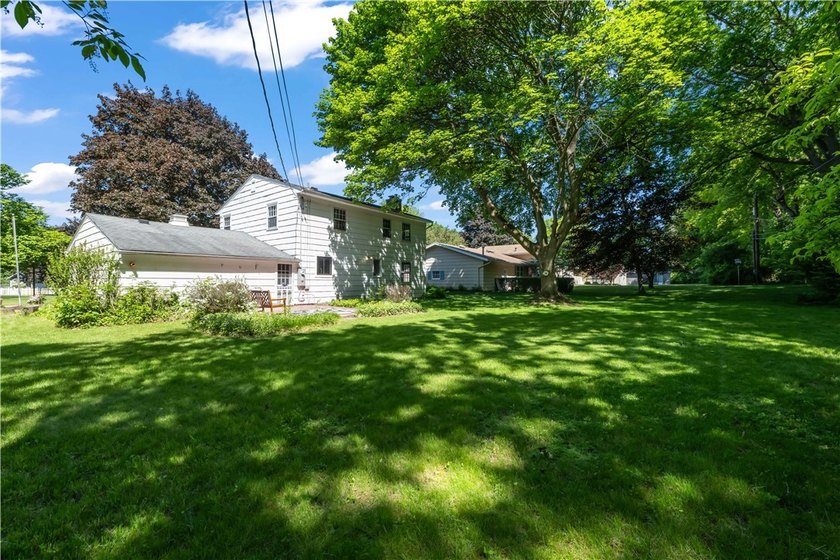 Beautifully updated 4-bedroom, 1.5-bath Colonial nestled on a - photo 32