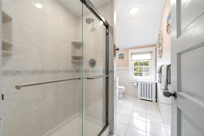 Nestled in the heart of sought-after South Sayville, this - photo 27