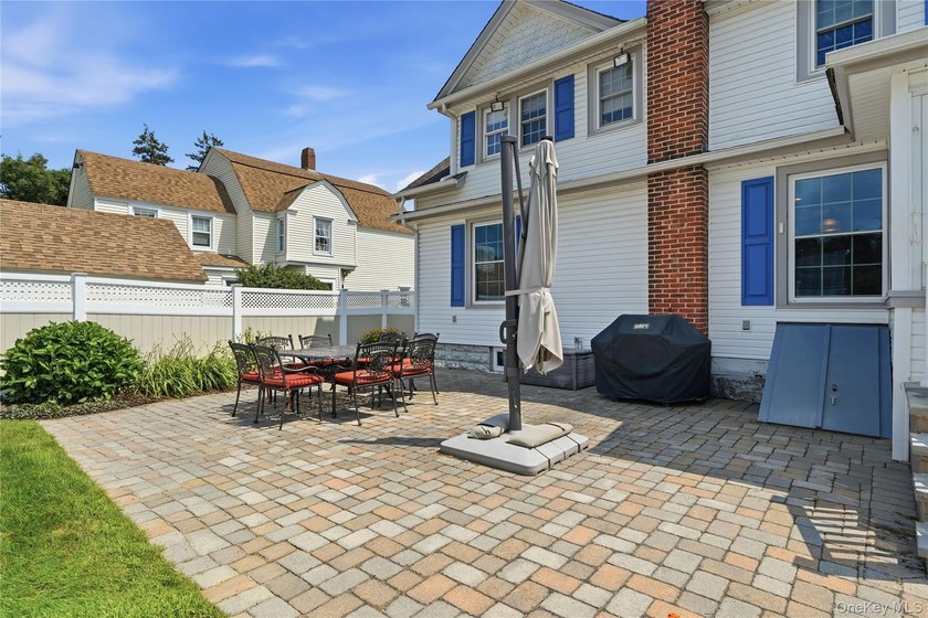 Nestled in the heart of sought-after South Sayville, this - photo 40