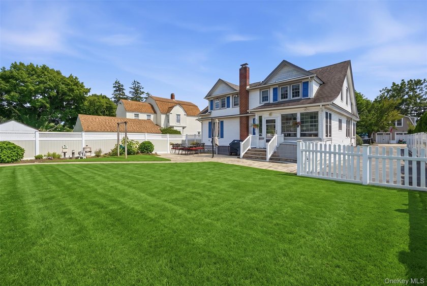 Nestled in the heart of sought-after South Sayville, this - photo 41