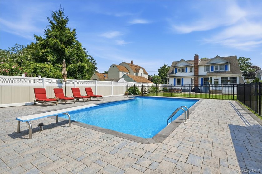 Nestled in the heart of sought-after South Sayville, this - photo 44