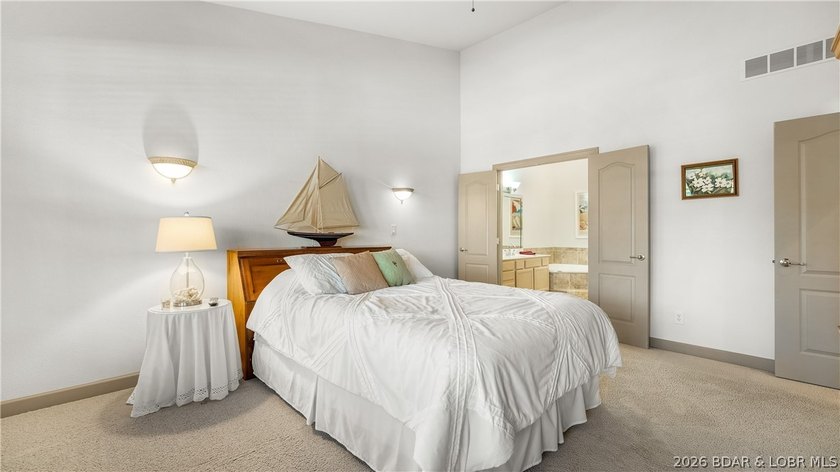 Come home to this inviting, welcoming villa at The Palms in Lake - photo 11