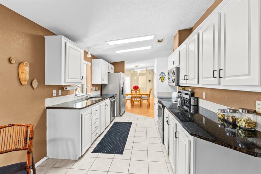 Experience effortless Florida living in this meticulously - photo 12