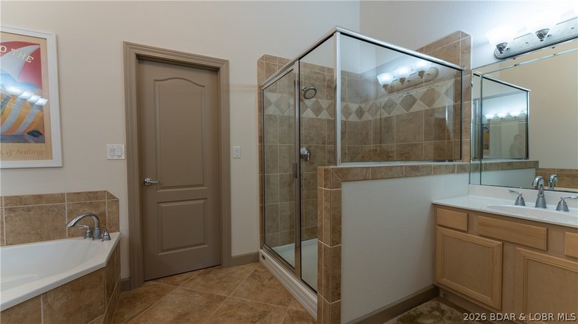 Come home to this inviting, welcoming villa at The Palms in Lake - photo 14
