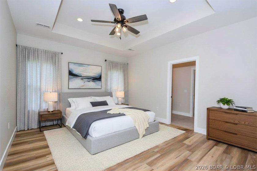 BRAND NEW HOME in the HEART of Osage Beach!! This striking home - photo 26