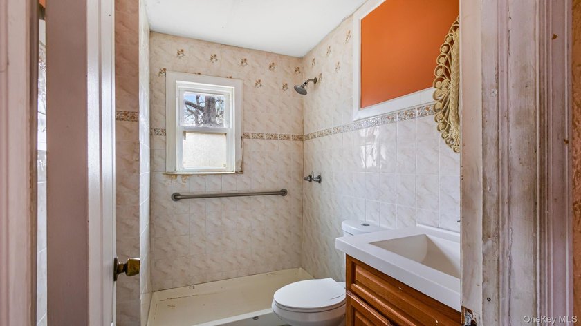 This spacious corner property nestled on a estimated half-acre - photo 21